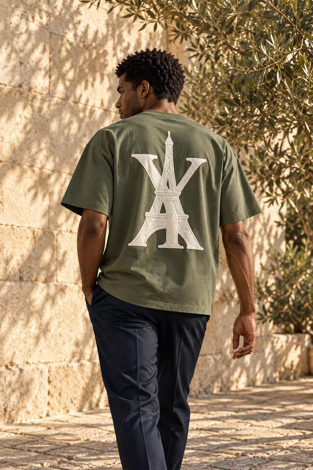 Campaign image — Eiffel Monogram Tee in Olive, rear view